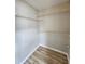 Organized closet with wire shelving and wood-look floors, maximizing space for storage and a tidy appearance at 3786 Hitchcock Way # 321, Myrtle Beach, SC 29577