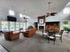 Spacious clubhouse featuring a fireplace, bar, and large windows at 3786 Hitchcock Way # 321, Myrtle Beach, SC 29577