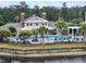 View of the community pool and clubhouse with waterfront views at 3786 Hitchcock Way # 321, Myrtle Beach, SC 29577