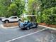 A stylish blue golf cart parked at the property, offering a convenient mode of transport around the community at 3786 Hitchcock Way # 321, Myrtle Beach, SC 29577