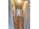 Inviting hallway with durable wood-look flooring and neutral paint, perfect for easy maintenance and a modern aesthetic at 3786 Hitchcock Way # 321, Myrtle Beach, SC 29577