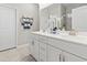 Modern bathroom featuring double sinks, white cabinetry, and elegant fixtures at 4027 Taranto Loop # C, Myrtle Beach, SC 29579