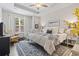 Comfortable bedroom with a queen-sized bed, soft bedding, and natural light at 4027 Taranto Loop # C, Myrtle Beach, SC 29579