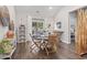 Charming dining area with a round table, seating for four, and stylish coastal decor at 4027 Taranto Loop # C, Myrtle Beach, SC 29579