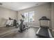 Bright home gym with treadmills, elliptical, and natural light for a healthy lifestyle at 4027 Taranto Loop # C, Myrtle Beach, SC 29579