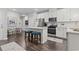 Stylish kitchen with white cabinets, stainless steel appliances, and modern decor at 4027 Taranto Loop # C, Myrtle Beach, SC 29579