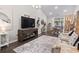 Cozy living area with modern decor and a patio view for seamless indoor-outdoor living at 4027 Taranto Loop # C, Myrtle Beach, SC 29579