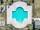 Aerial shot of clover-shaped pool and pool area with playground, providing a fun outdoor space at 4027 Taranto Loop # C, Myrtle Beach, SC 29579