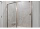 Sleek walk-in shower with a tiled surround and a built-in bench for added comfort at 4027 Taranto Loop # C, Myrtle Beach, SC 29579