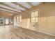 Spacious sun room featuring wood-look flooring and ample natural light at 409 14Th Ave. S, North Myrtle Beach, SC 29582