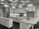Bright, spacious kitchen featuring modern cabinetry, marble countertops, and pendant lighting at 4110 Gray Heron Dr., North Myrtle Beach, SC 29582