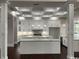 Bright, spacious kitchen featuring modern cabinetry, marble countertops, and pendant lighting at 4110 Gray Heron Dr., North Myrtle Beach, SC 29582