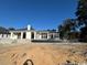 Modern backyard featuring a gorgeous pool, and a covered patio perfect for relaxing and entertaining guests at 4300 Gray Heron Dr., North Myrtle Beach, SC 29582