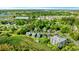 Picturesque aerial view of a vibrant coastal neighborhood with lush greenery and stunning waterfront views, showcasing community charm at 4363 Bayshore Dr., Little River, SC 29566