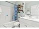 Clean bathroom featuring a shower/tub combo, ample storage, and modern fixtures at 4363 Bayshore Dr., Little River, SC 29566