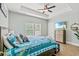 Comfortable bedroom with tray ceilings, bright light and warm, welcoming color schemes at 4363 Bayshore Dr., Little River, SC 29566
