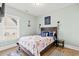 Nautical themed bedroom featuring a calming color palette and cozy bedding for a serene retreat at 4363 Bayshore Dr., Little River, SC 29566