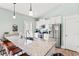 Modern kitchen with granite countertops, stainless steel appliances and ample counter space at 4363 Bayshore Dr., Little River, SC 29566
