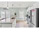 Bright kitchen with stainless steel appliances and granite countertops perfect for cooking at 4363 Bayshore Dr., Little River, SC 29566