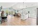 Spacious open-concept living area combining the kitchen, dining, and living room; ample natural light at 4363 Bayshore Dr., Little River, SC 29566