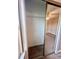 Mirrored closet reflecting a bedroom with carpet, ceiling fan and providing ample storage space at 4394 Daphne Ln. # F, Murrells Inlet, SC 29576