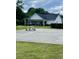 Community clubhouse with a spacious patio and well-manicured lawn at 4394 Daphne Ln. # F, Murrells Inlet, SC 29576
