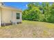 Spacious backyard with lush greenery and mature trees offering shade at 454 Sean River Rd., Conway, SC 29526