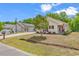 Inviting single-story house with red shutters and an American flag on display at 454 Sean River Rd., Conway, SC 29526