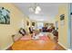 Open living and dining room featuring wood floors, plenty of natural light, and comfortable seating at 454 Sean River Rd., Conway, SC 29526