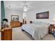 Comfortable main bedroom featuring a bed, dresser, carpet, and ceiling fan at 454 Sean River Rd., Conway, SC 29526