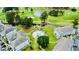 Aerial view of a residential complex with a swimming pool and golf course at 4783 Wild Iris Dr. # 101, Myrtle Beach, SC 29577