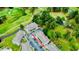 Aerial view of building complex with reserved parking and golf course views at 4783 Wild Iris Dr. # 101, Myrtle Beach, SC 29577