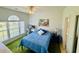 Bedroom with a full size bed, desk, and window at 4783 Wild Iris Dr. # 101, Myrtle Beach, SC 29577
