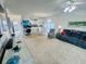 Open living space with modern lighting, a dining table, a sofa, and desk area at 4783 Wild Iris Dr. # 101, Myrtle Beach, SC 29577