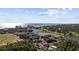 Aerial view showcasing the condo community, a lake, a golf course, and the coastline in the background at 501 Maison Dr. # G-14, Myrtle Beach, SC 29572