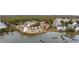 Aerial view of waterfront condos surrounded by water and lush trees at 501 Maison Dr. # G-14, Myrtle Beach, SC 29572