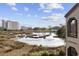Scenic view of a lake and marshland, enhanced by a mix of residential and natural beauty at 501 Maison Dr. # G-14, Myrtle Beach, SC 29572