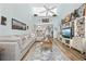 Open floor plan living room featuring vaulted ceiling, wood floors, and lots of natural light at 501 Maison Dr. # G-14, Myrtle Beach, SC 29572
