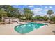 Community pool area featuring clear blue water, plenty of seating, and a pool house at 501 Maison Dr. # G-14, Myrtle Beach, SC 29572