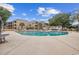 Community pool area with clear blue water, surrounded by lounge chairs and lush landscaping near the condos at 501 Maison Dr. # G-14, Myrtle Beach, SC 29572