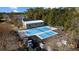 Aerial view of private tennis and pickleball courts with lake views at 501 Maison Dr. # G-14, Myrtle Beach, SC 29572