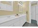 Bathroom featuring a double vanity with white cabinets, tile floors, and modern lighting at 520 Chapman Loop, Pawleys Island, SC 29585
