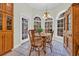 Cozy breakfast nook with table, four chairs, and bright window views at 520 Chapman Loop, Pawleys Island, SC 29585
