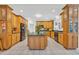 Spacious kitchen with wooden cabinets, a large island, and modern appliances at 520 Chapman Loop, Pawleys Island, SC 29585