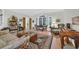 Bright living room with hardwood floors, ornate furnishings, and arched windows at 520 Chapman Loop, Pawleys Island, SC 29585