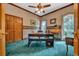 Traditional home office featuring dark wood accents, elegant wallpaper, and ample natural light at 520 Chapman Loop, Pawleys Island, SC 29585