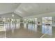 Spacious activity room with large windows and ample natural light, perfect for gatherings and recreational activities at 5406 Longhorn Dr., Myrtle Beach, SC 29588