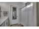 Bathroom featuring a single vanity, shower, and neutral tile floors at 5406 Longhorn Dr., Myrtle Beach, SC 29588