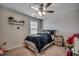 Inviting bedroom featuring ceiling fan, a comfortable bed, and decorative wall hooks, ideal for children at 5406 Longhorn Dr., Myrtle Beach, SC 29588