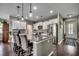 Stylish kitchen featuring a granite island with seating and sleek stainless steel appliances at 5406 Longhorn Dr., Myrtle Beach, SC 29588